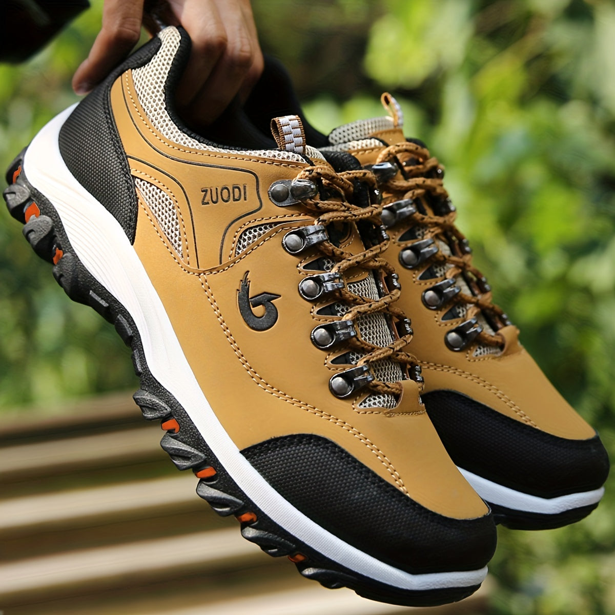 Durable lace-up sneakers for men with breathability, ideal for hiking.