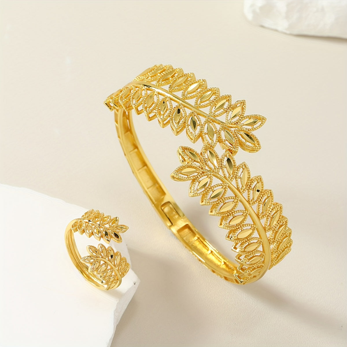 Wedding bride sleeve hand decoration set featuring a 24K gold plated light luxury leaf design, perfect for Middle East Ramadan celebrations. Includes a stunning bracelet and matching ring.