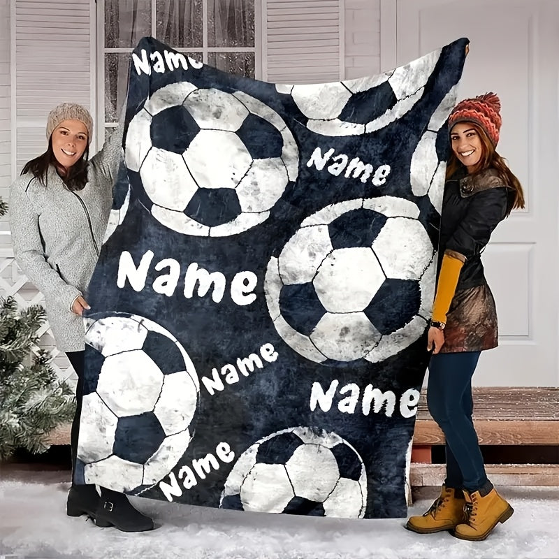 Customize your soccer ball patterned throw blanket with your name in a contemporary style. This all-season blanket is made of knitted 100% polyester, featuring a digital print that is tear-resistant and machine washable. Perfect for use on the sofa, bed