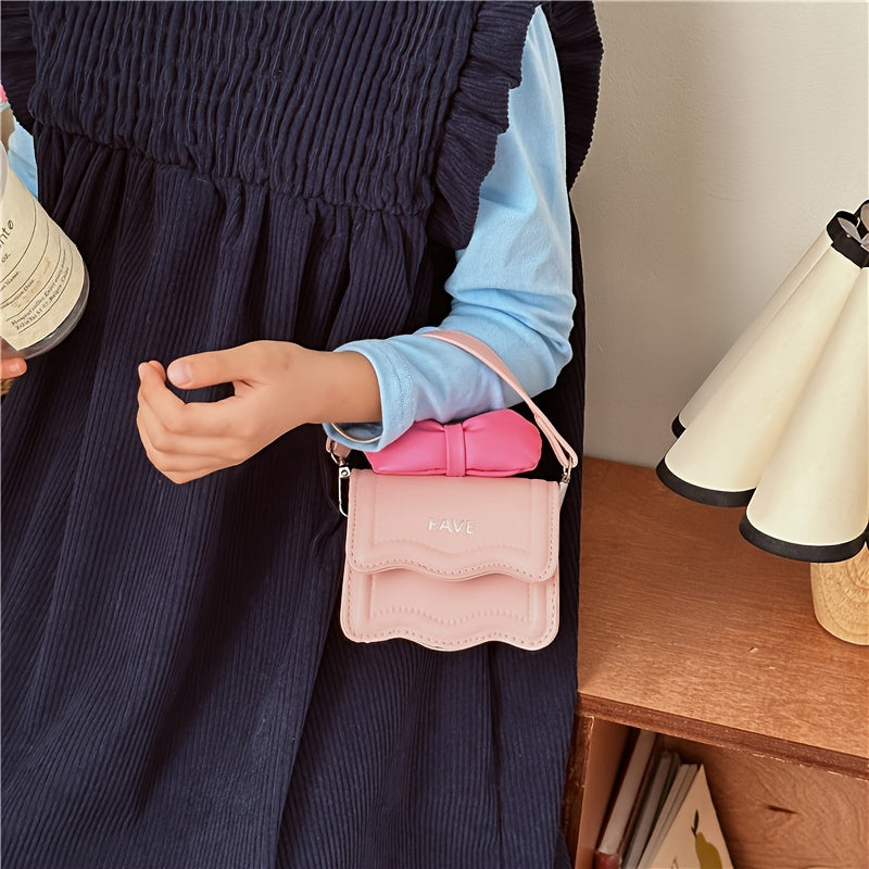 Stylish youngsters' crossbody bag in pink with bow accent and "FAVE" embossed flap. Lightweight, adjustable strap, casual sporty design, easy to clean. Perfect for daily commute.