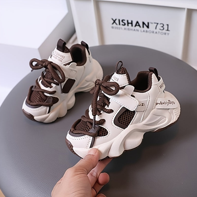 Durable slip-resistant baby boys' sneakers for casual wear in spring and fall.