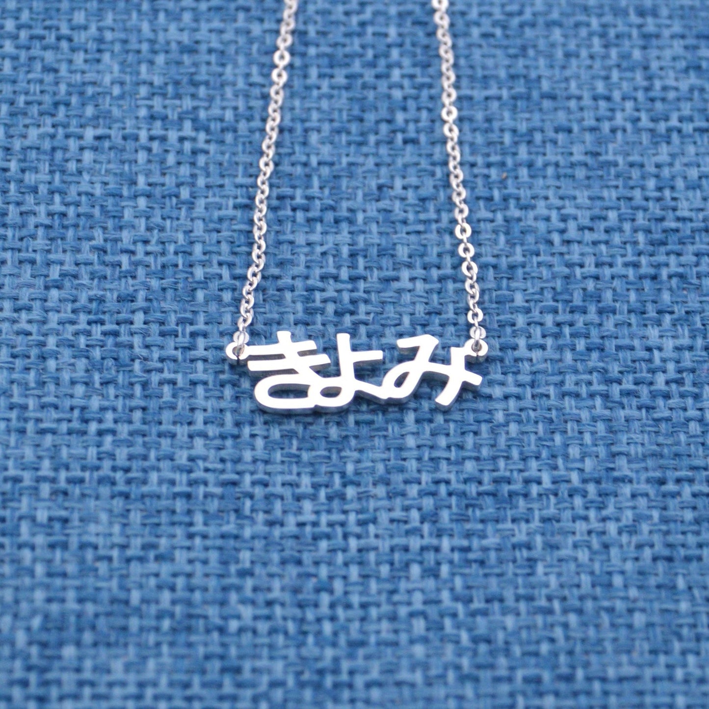 Handmade personalized stainless steel necklace with custom Japanese name in Hiragana, perfect for gifting to women