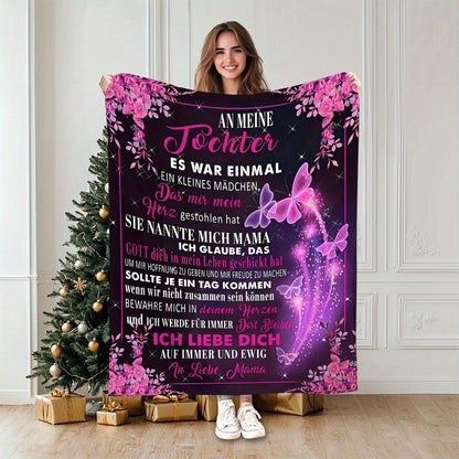 A contemporary soft flannel fleece blanket featuring a German message from Mom to Daughter, adorned with a beautiful purple butterfly and floral pattern. Suitable for all seasons with a digital print, made from 100% polyester and weighing 200-250gsm.