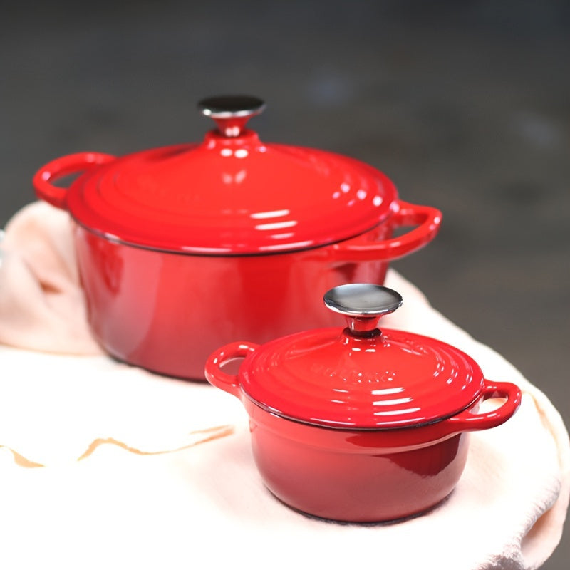 Enameled cast iron health pot, versatile for cooking rice and other dishes on induction, ceramic, electric, halogen, and gas cooktops. Comes in two sizes: 30.4oz and 60.8oz. Boasts enamel non-stick coating for easy cleaning.