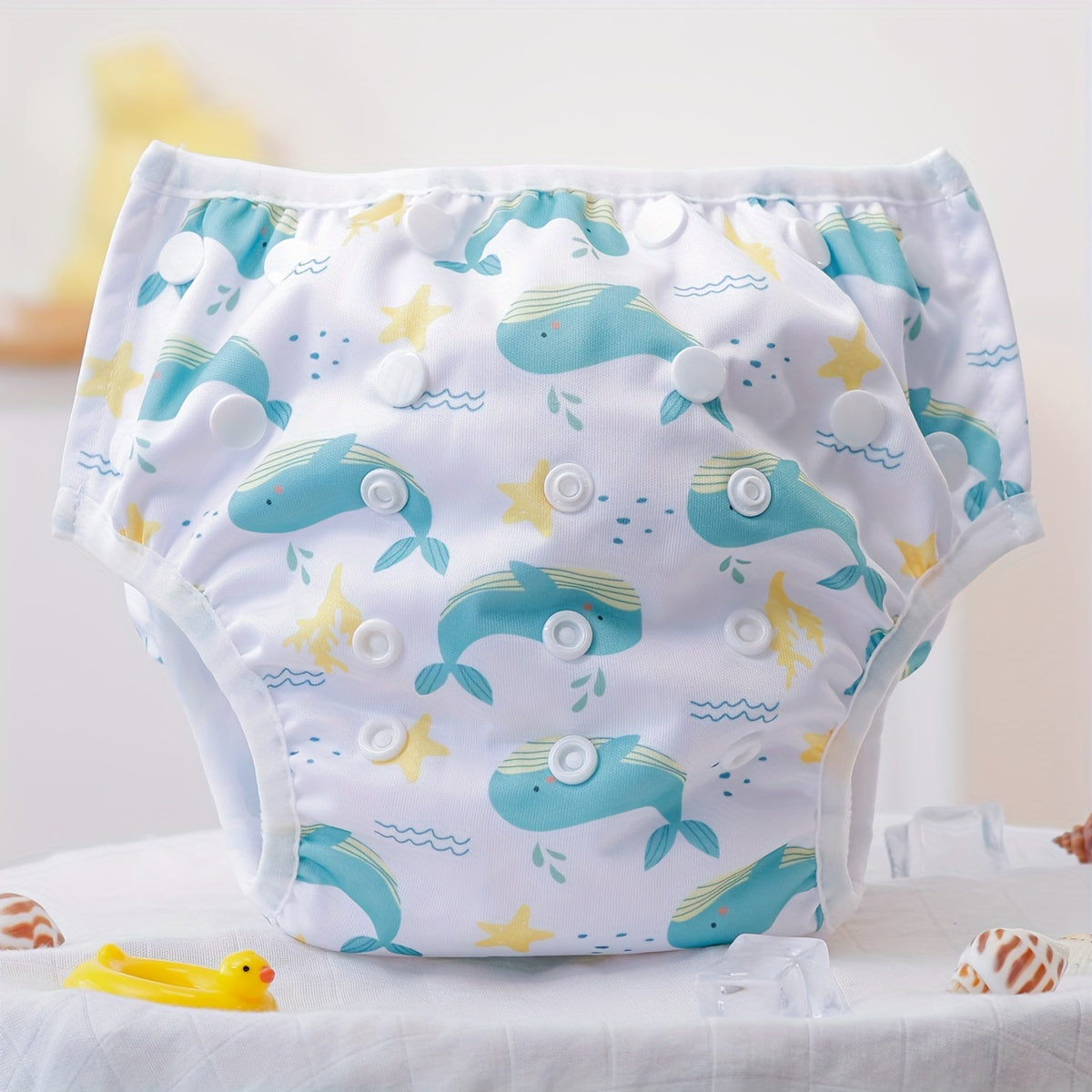 Soft, breathable, and waterproof swim wear for babies and newborns. These adjustable, easy-wash swim diapers are reusable for convenient and eco-friendly use.