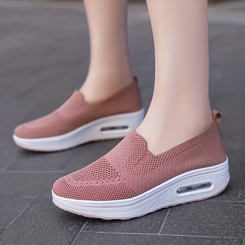 Women's slip-on sneakers from the Spring Collection in solid colors of black, light gray, pink, and dark blue. Features breathable knit fabric, air cushion sole, and low-top design for