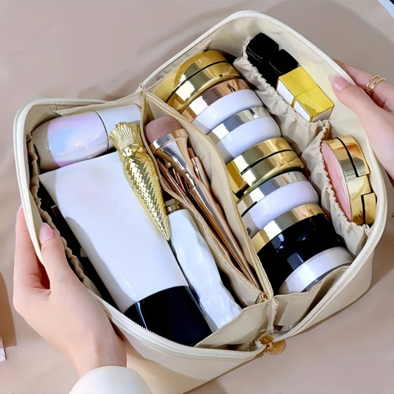 Double-layer travel cosmetic bag in leather for men and women.