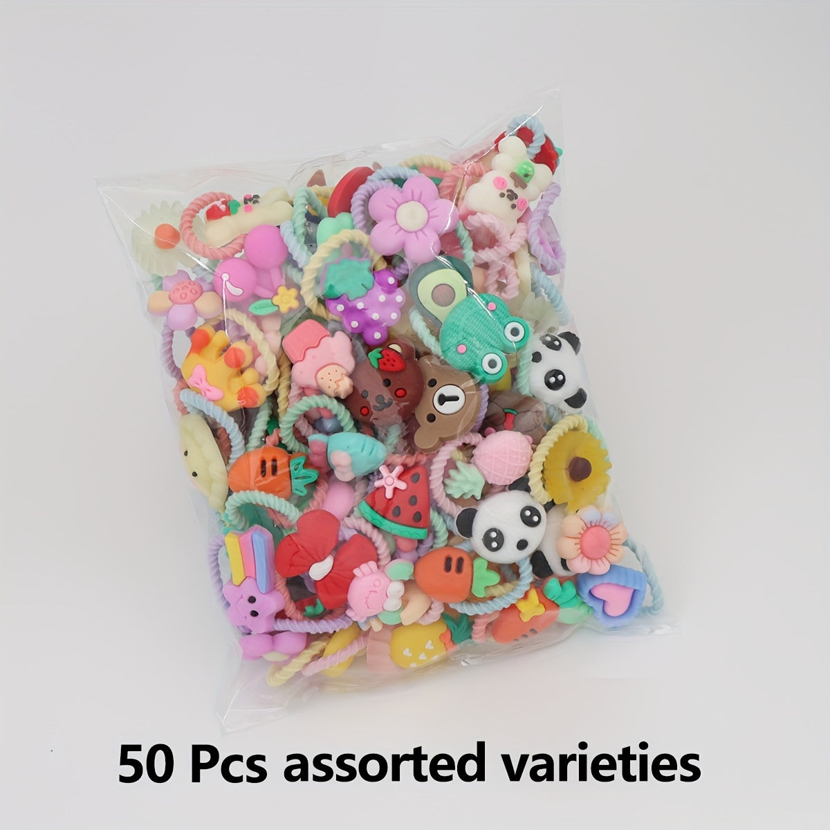 50 girl's hairbands with cartoon animals, flowers, and fruit, ideal for festive gifts.