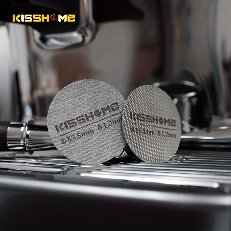 Reusable espresso puck screen made of 316 stainless steel, heat resistant, available in diameters of 51mm, 53.5mm, and 58.5mm. Compatible with Breville machines and 51mm, 54mm, and 58mm portafilters. Includes coffee accessories.