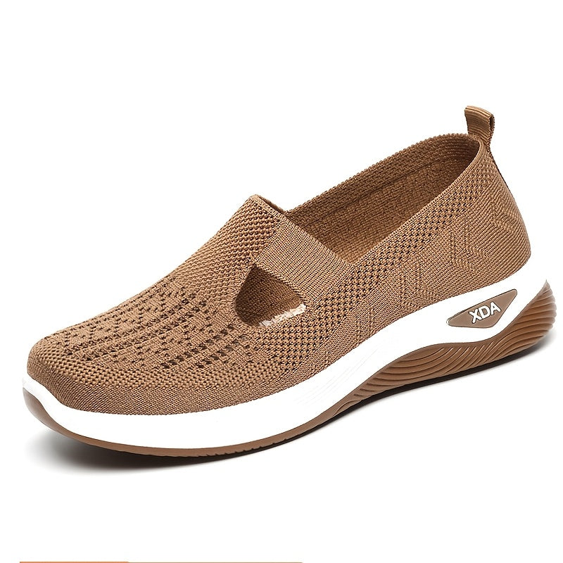 Casual slip on sneakers for women, lightweight and breathable with fabric upper and rubber sole, perfect for spring and summer.