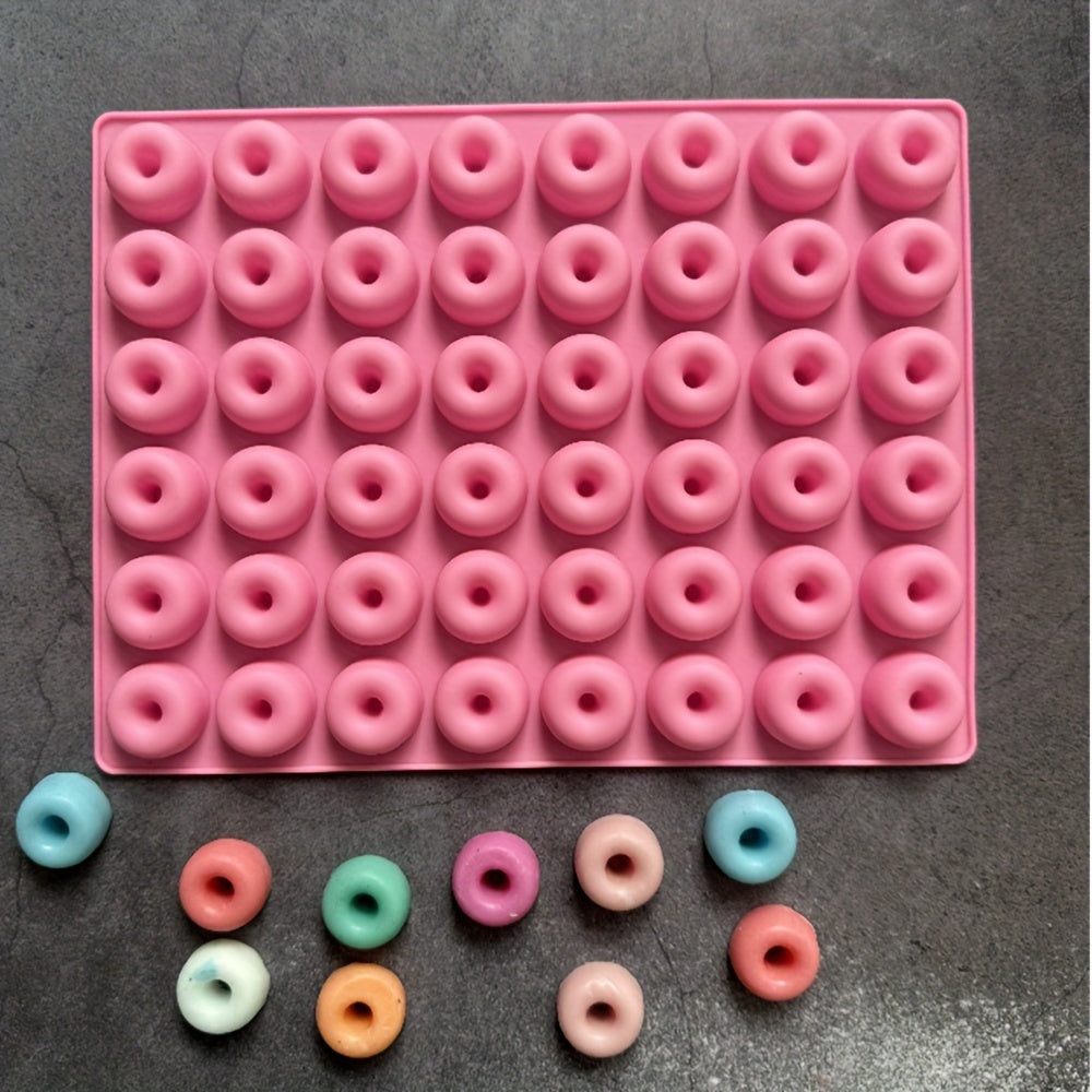 Silicone mini donut mold with 48 cavities, measuring 19.81*14.99cm for handmade homemade baking and DIY candy and chocolate making.