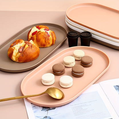 2-piece set of oval PP plastic serving trays for desserts and pastries, ideal for home, restaurants, and cafes.