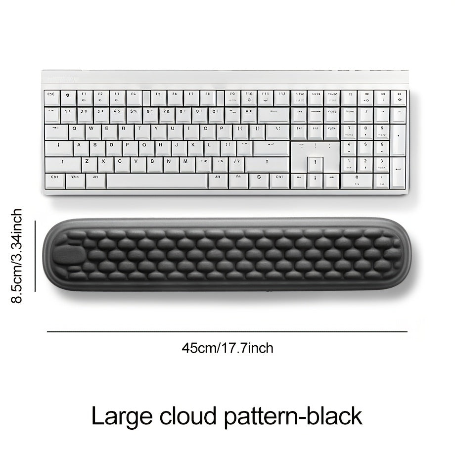 Ergonomic keyboard and mouse wrist rests for comfortable typing and mousing.