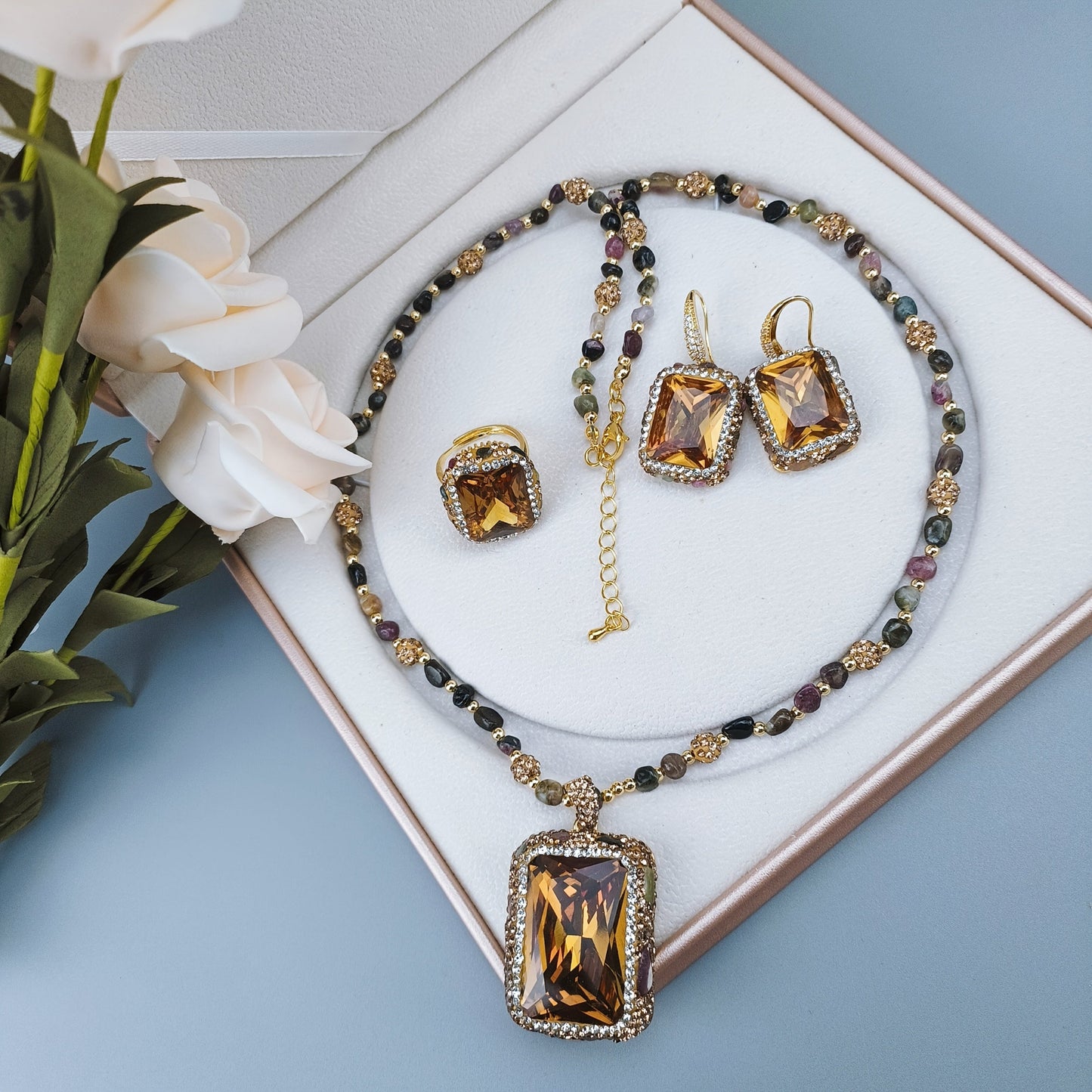 Complete your everyday look with this Boho-Chic 3-piece Jewelry Set featuring stunning Color-Shifting Turkish & Sudanese Stones - Set includes Necklace, Earrings, and Ring for a touch of glamour.