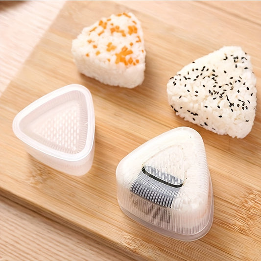 Clear plastic sushi mold with lid for making triangle-shaped rice balls at home or in restaurants. Suitable for beginners and professionals in sushi making.