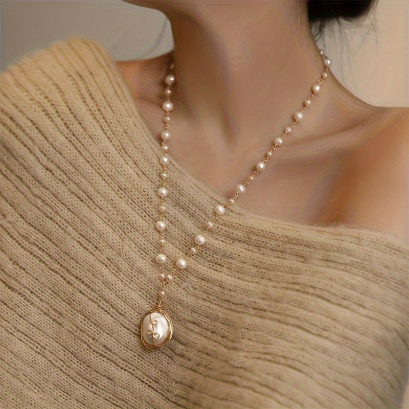 Vintage Baroque Pearl Necklace for Women - a stunning accessory that adds elegance to any outfit. Featuring freshwater pearls on a clavicle chain, this fashionable pendant boasts a simple yet stylish design. Made from high-quality alloy, this necklace is