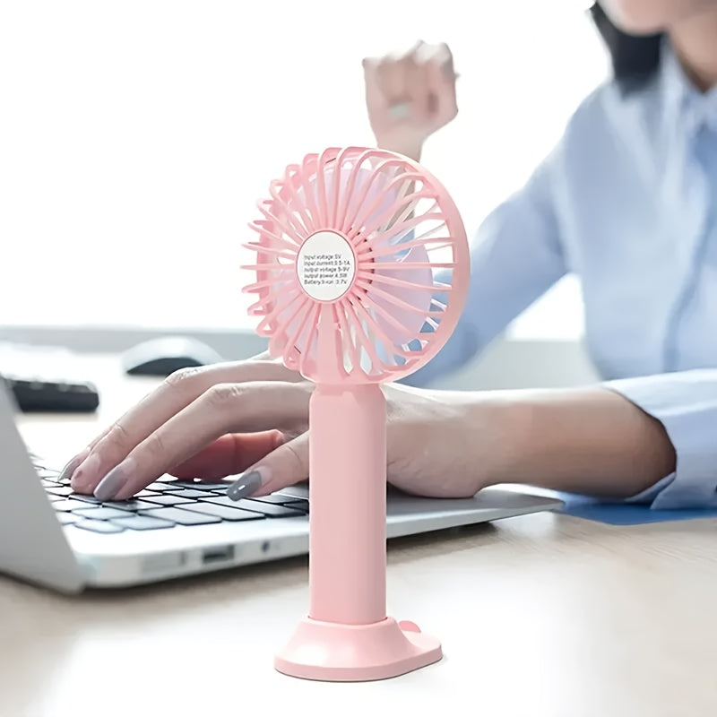 TOOP Portable Handheld USB Mini Fan with Phone Holder is a convenient and versatile personal fan with a high-speed feature, button control, and durable plastic construction suitable for indoor and outdoor use. With air circulation recommended, it