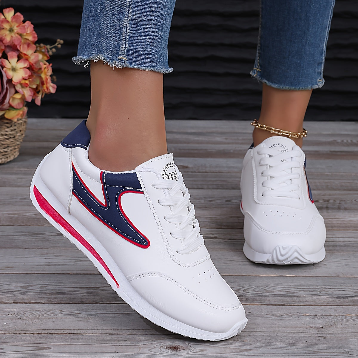 Trendy colorblock women's sneakers with soft platform sole, lace-up design, perfect for casual walking.