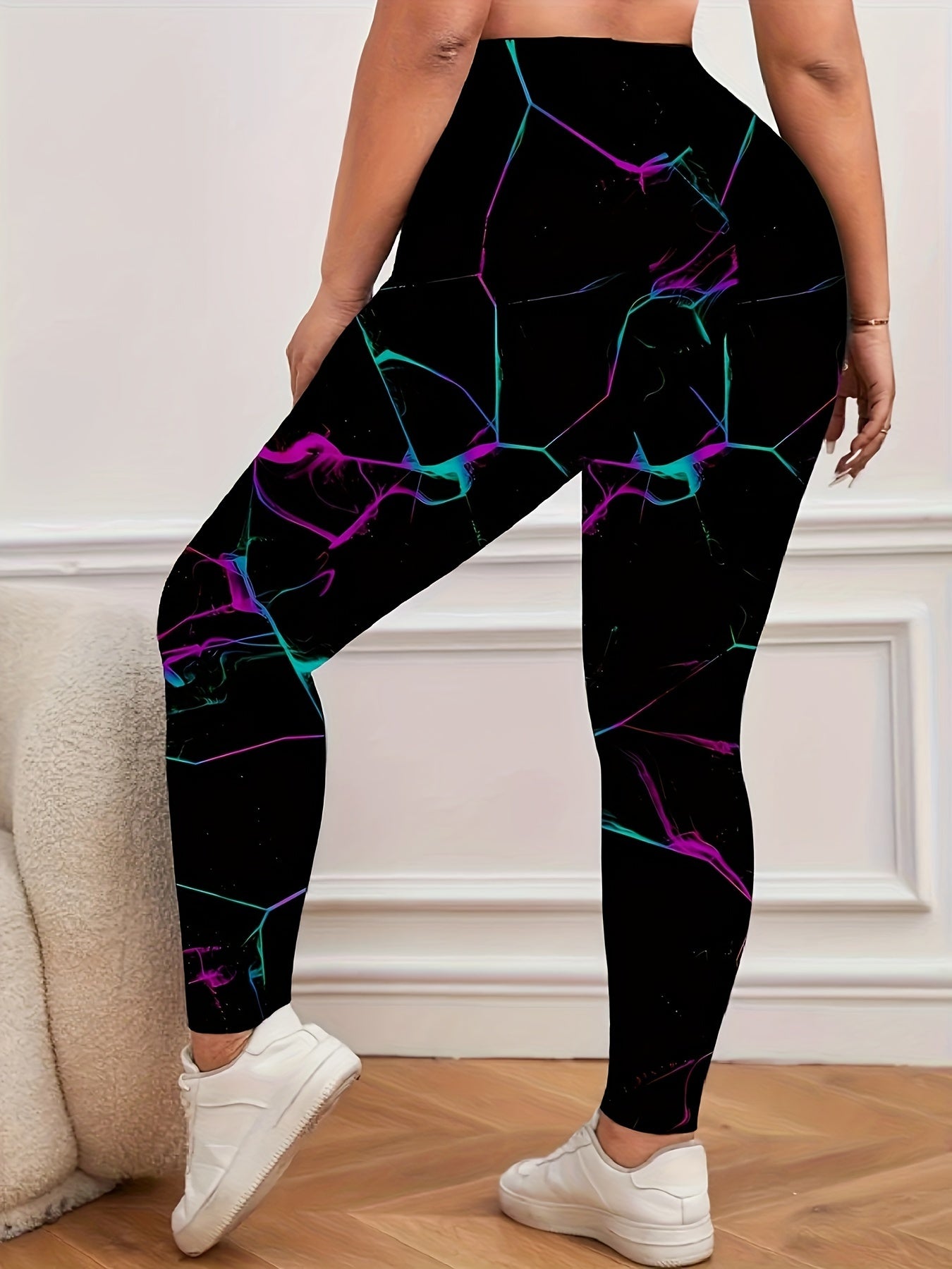 High-waisted floral print leggings for women in plus size. Stretchy, casual, and machine washable. Black with vibrant purple & teal accents. Suitable for all seasons, with a comfortable fit.