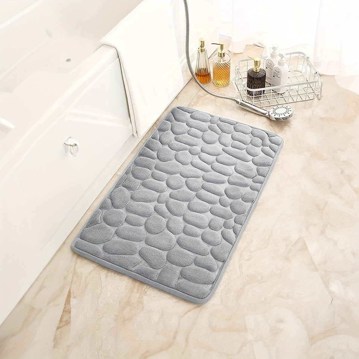 1 piece of Pebble Pattern Floor Mat made with memory cotton for the bathroom, designed to absorb water at the doorstep, featuring a non-slip backing for added safety. Can also be used as a carpet.