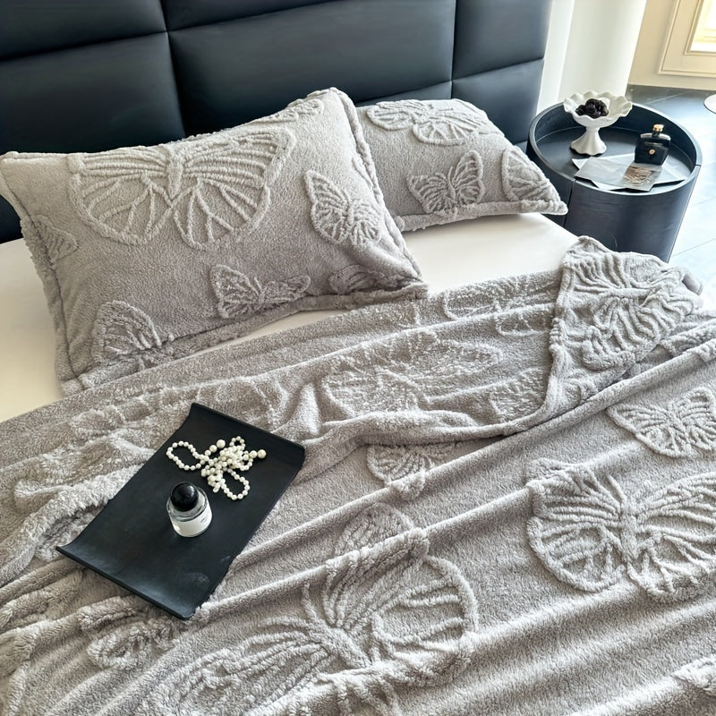 Soft and comfortable butterfly jacquard nap blanket available in milky white, camel, pink, green, purple, brown, gray, and blue gray. Perfect for use in the office, on the sofa, in the living room, or in the car.