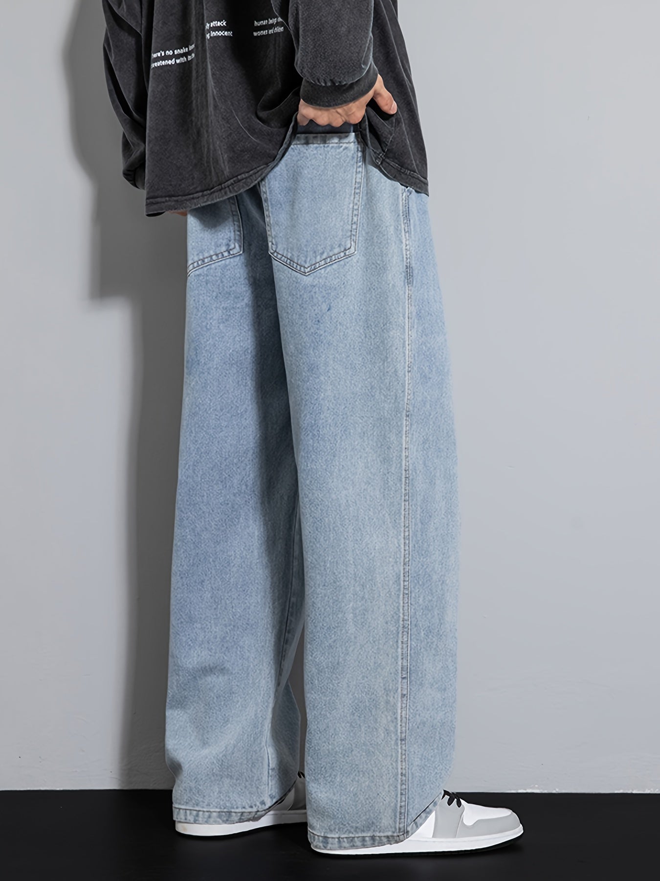 Men's wide leg denim jeans with drawstring waist, loose fit for hip-hop style.