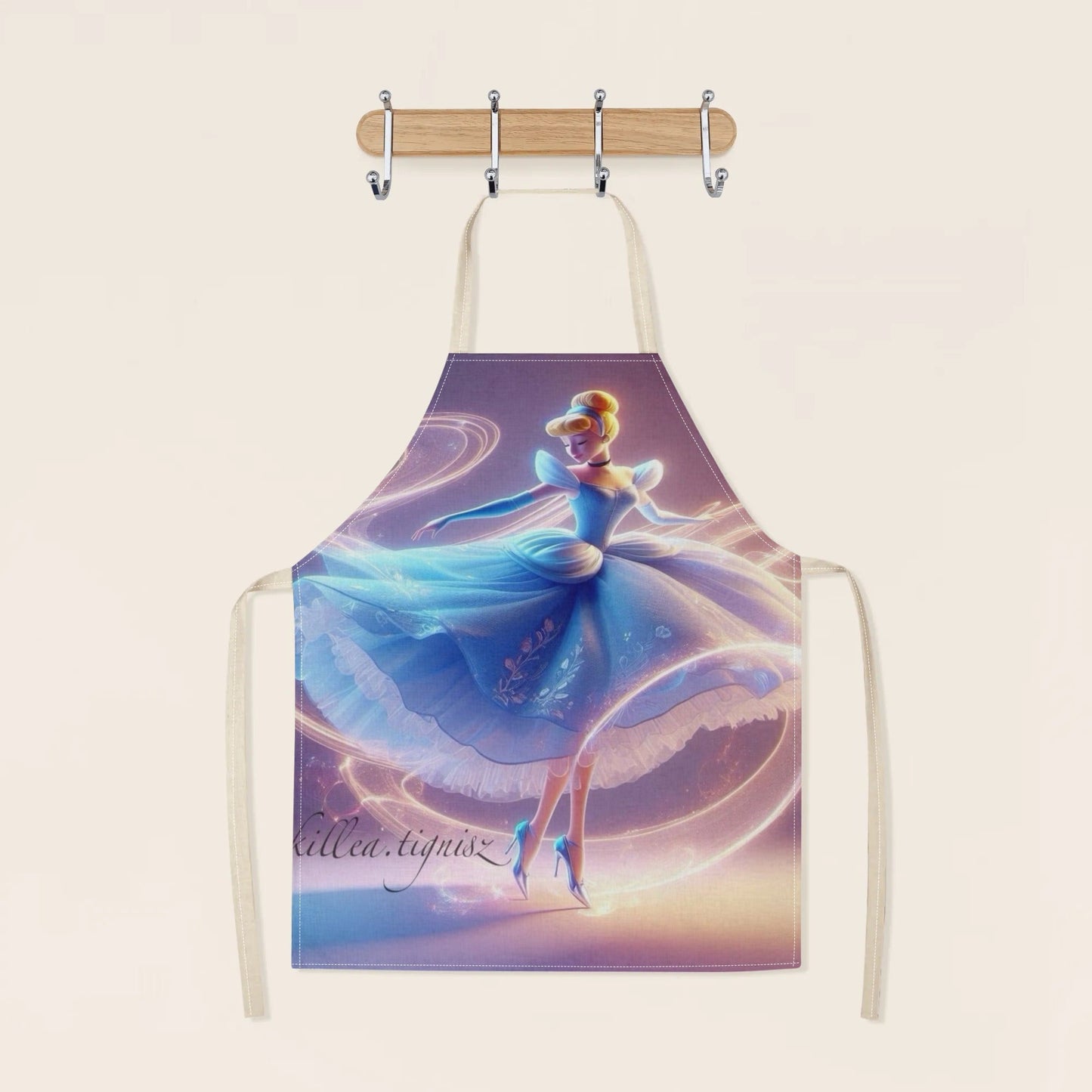 Waterproof apron featuring Disney's Cinderella cartoon character in a vibrant blue dress with a floral design. Made of durable polyester, perfect for use in hotels, supermarkets, restaurants, fruit shops, milk tea stands, and at home.