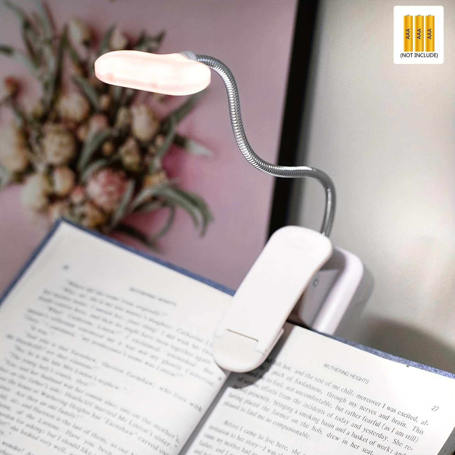 Portable battery-powered clip-on book light for reading that can also be used as a small table lamp or night light for room decor.