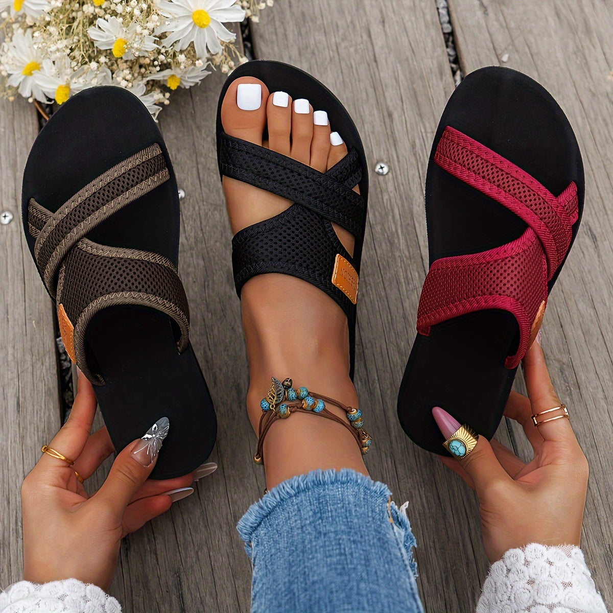 Breathable mesh slide sandals for women with crisscross straps, lightweight and comfortable. Available in Black/Brown or Red/Black. Suitable for casual indoor and outdoor wear.