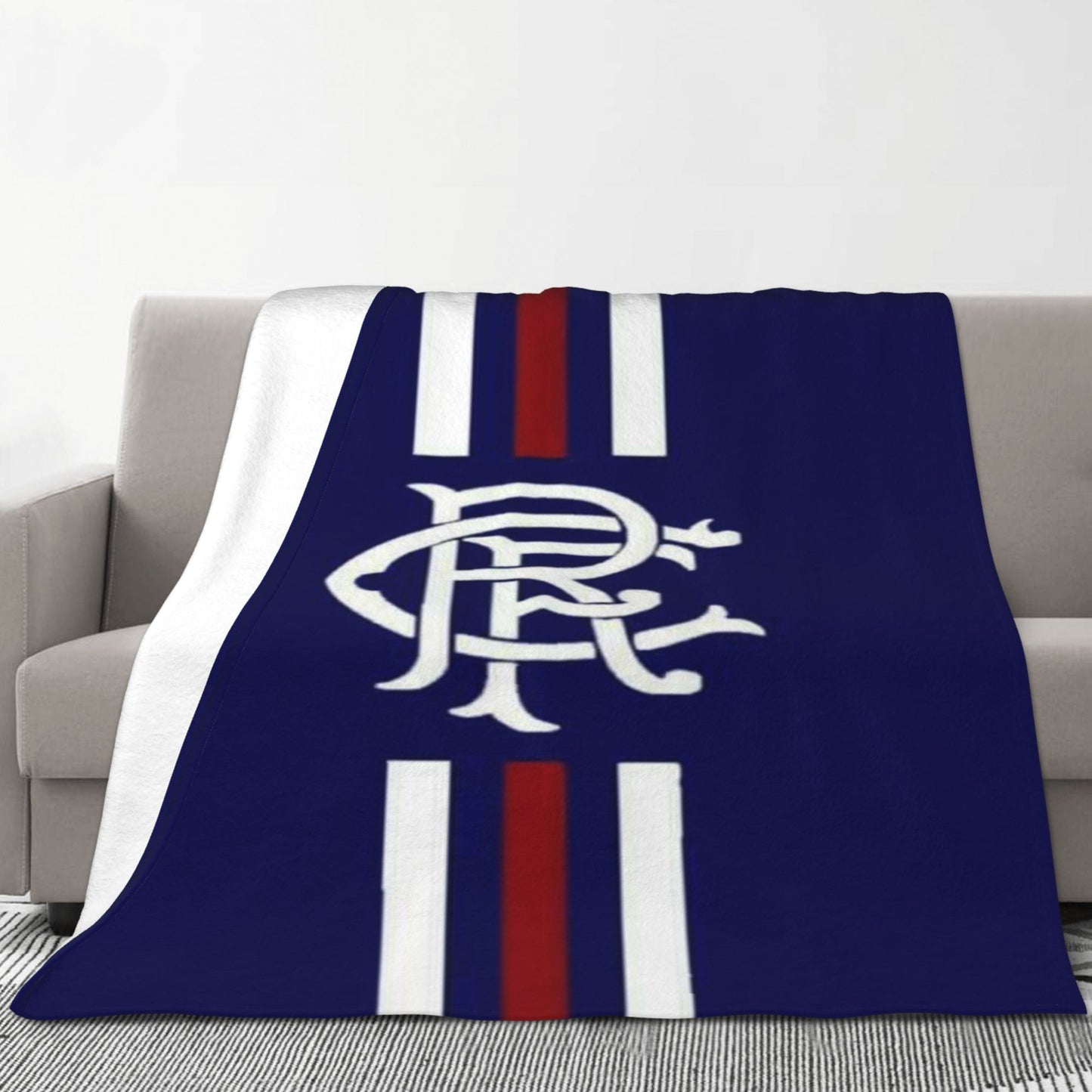 Stay cozy with this 1 piece Rangers Football Club printed flannel fleece blanket. Made with ultra soft plush flannel, this blanket is perfect for your bed or sofa all year round. Featuring a modern design and digital print craftsmanship, this blanket is