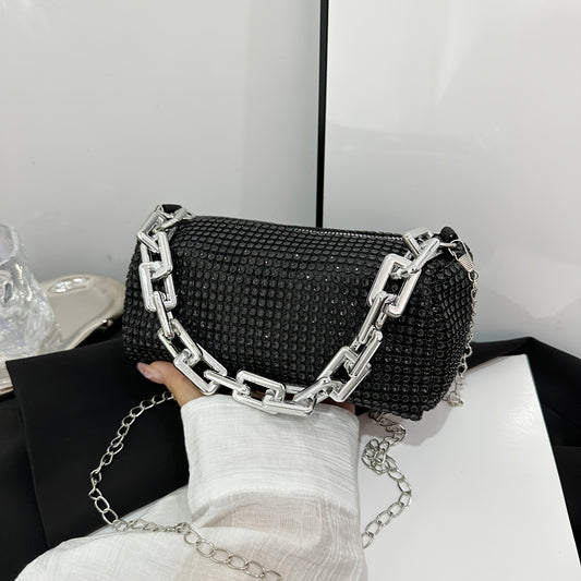 Stylish evening bag with chain straps, solid golden messenger bag with zip closure, polyester lining in silvery gray - a fashionable accessory for ladies.