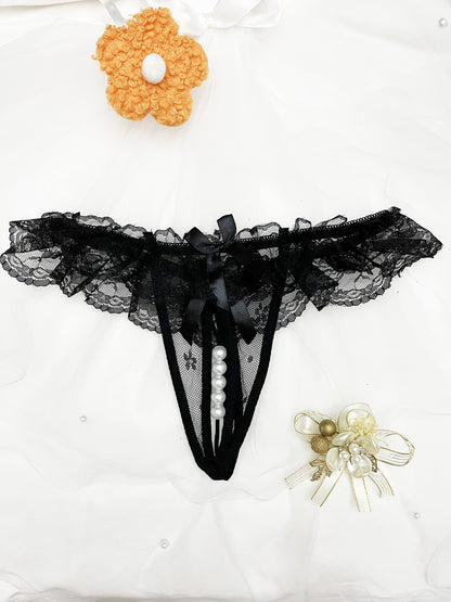 Two pack of solid color charm lace thongs with double bow and massage beaded detail.