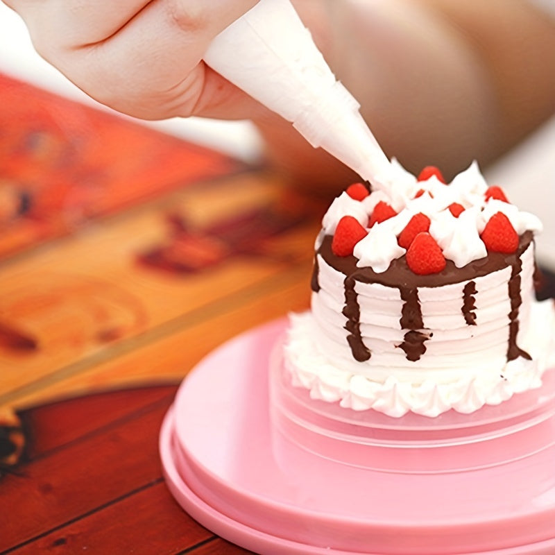 1 piece of a rotating cake turntable with a 13.97cm diameter. This mini plastic fondant cake turntable rotates 360 degrees, making it perfect for decorating cakes. It also serves as a revolving platform for round cookies. This kitchen accessory is an