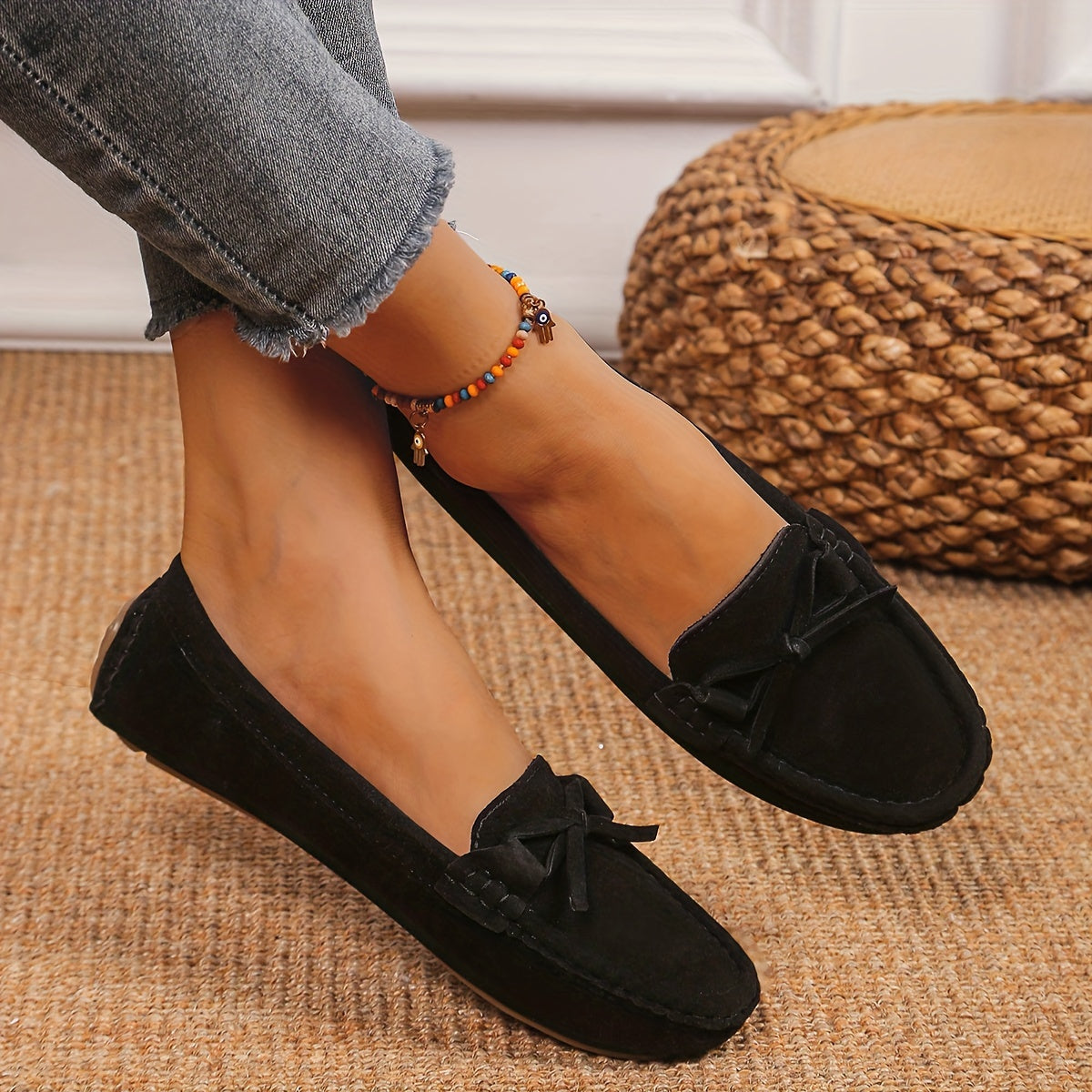 Retro flat loafers with bow detail, slip on style, and soft sole for casual wear.