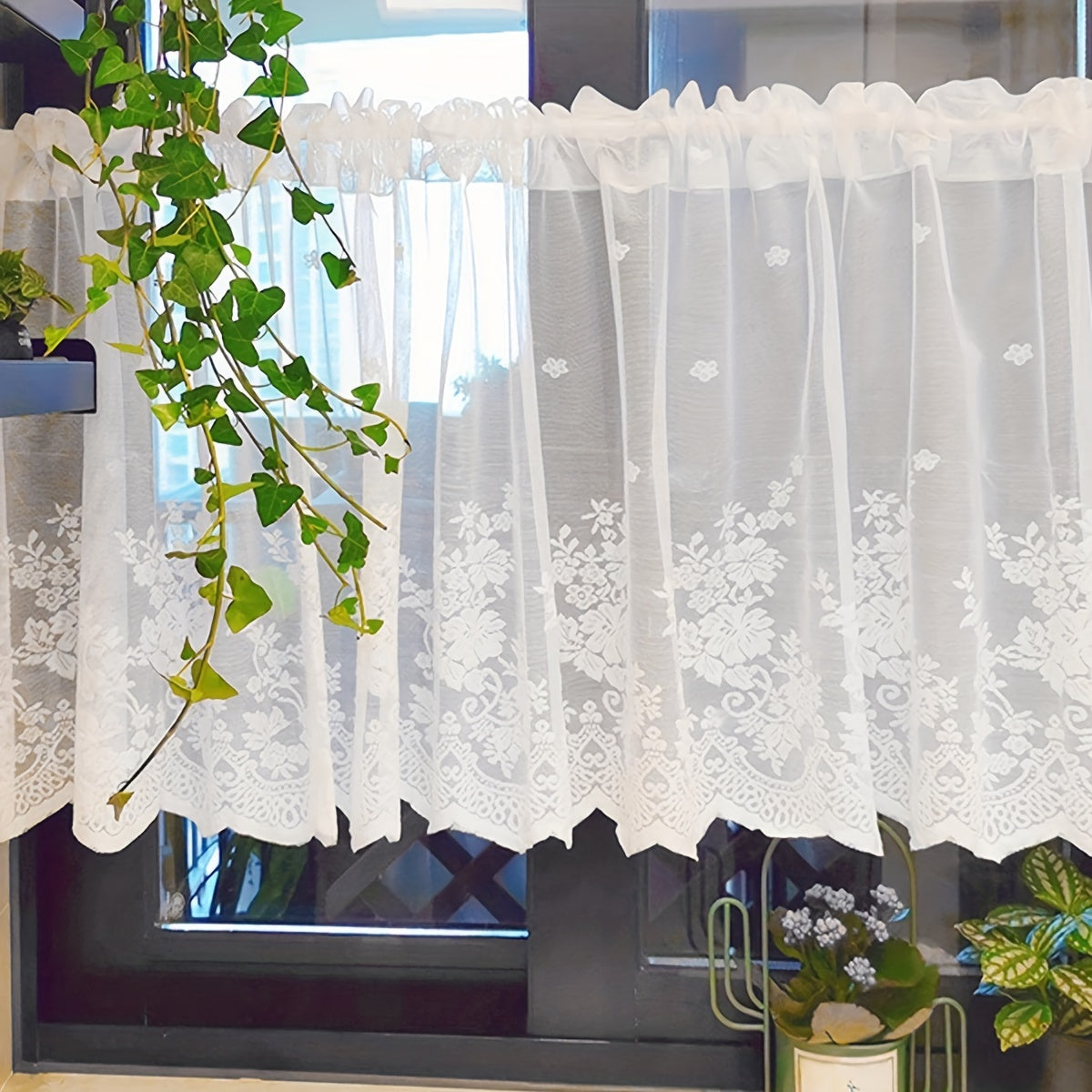 This affordable Lace Small Flower Cafe Curtain is dainty and charming, perfect for adding a touch of elegance to your kitchen or dining room. The curtain features a rod pocket design and is made of delicate white lace, making it suitable for window and