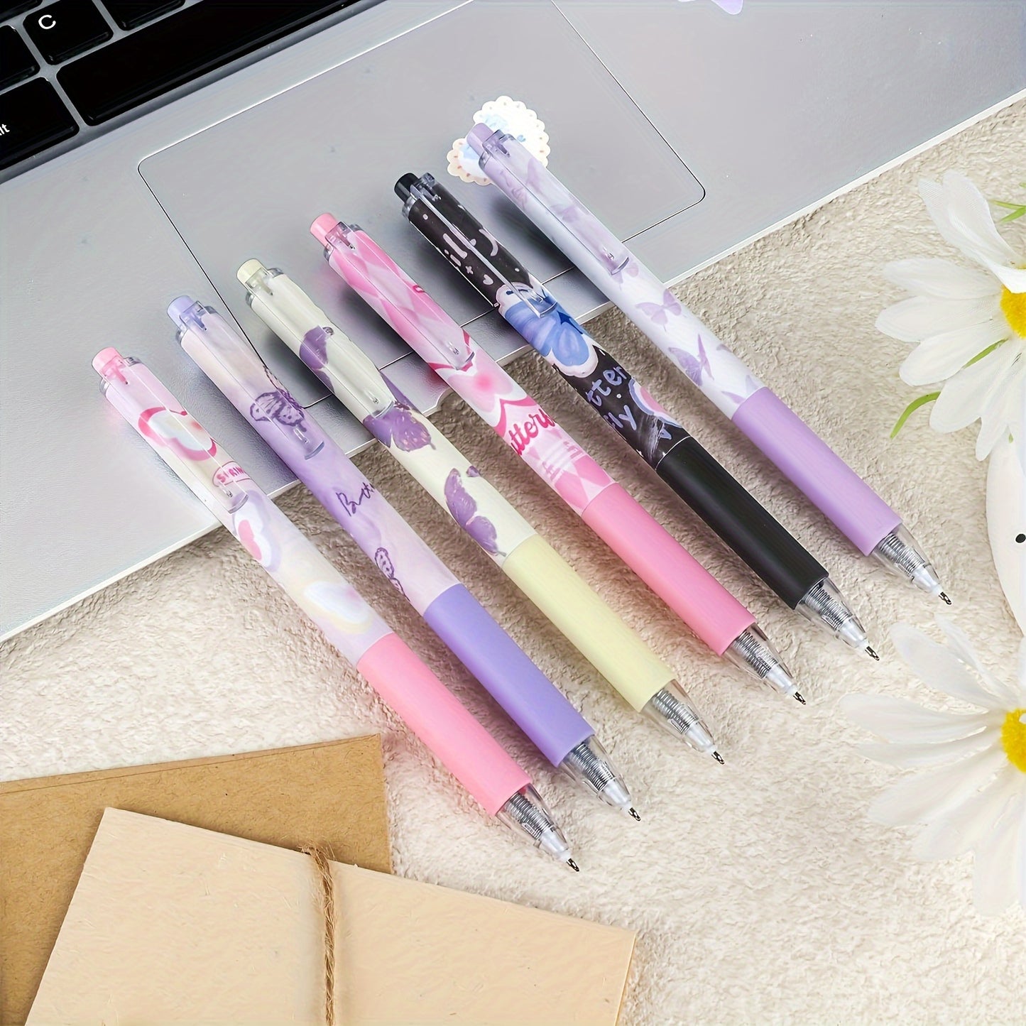 Set of 6 neutral aesthetic pens with black ink, 0.5mm fine tip for smooth writing, dreamy butterfly design ideal for school or office use.