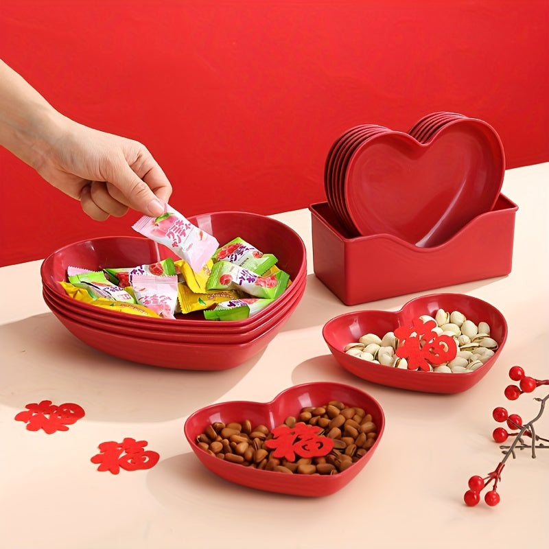 Heart-shaped plastic plates for weddings in sets of 4 or 8. Decorative red serving dishes for snacks, salads, and candy. Versatile party platters for all seasons.