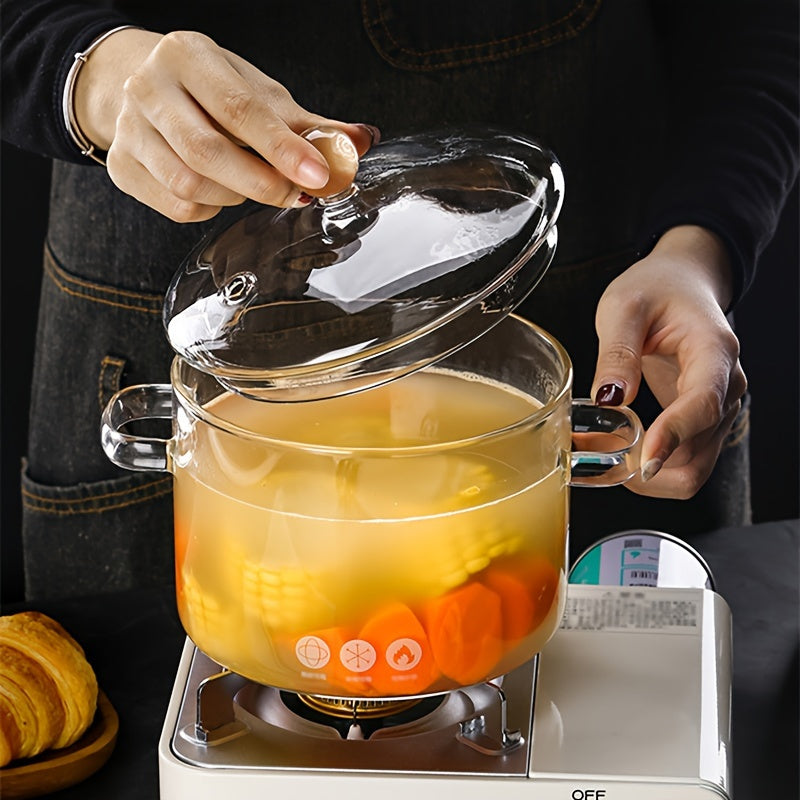 Transparent cooking pot with lid, resistant to high temperatures for gas stoves. This mini soup pot is made of high borosilicate glass, perfect for household use. It has a thickened large capacity, ideal for making supplementary food, soup, or stew.