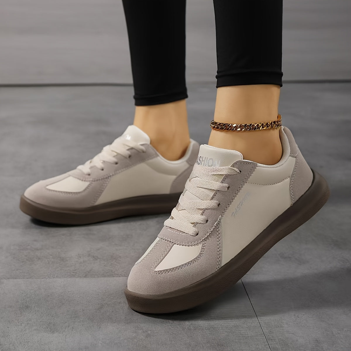 Casual lace-up women's sneakers with lightweight microfiber fabric, fabric inner and insole, and Phylon sole for all-season comfort. Hand washable.