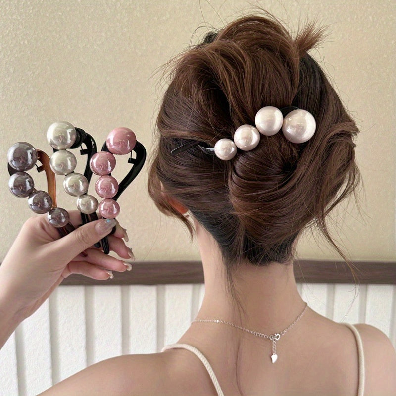 Stylish imitation pearl twist hairpin for daily wear and styling.