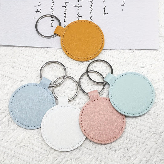 Craft your own leather keychains with this DIY kit containing 15/20 pieces. The round keychains are suitable for both men and women and come with PU leather blanks, key rings, and laser-engraved designs. Perfect for creating personalized holiday gifts or