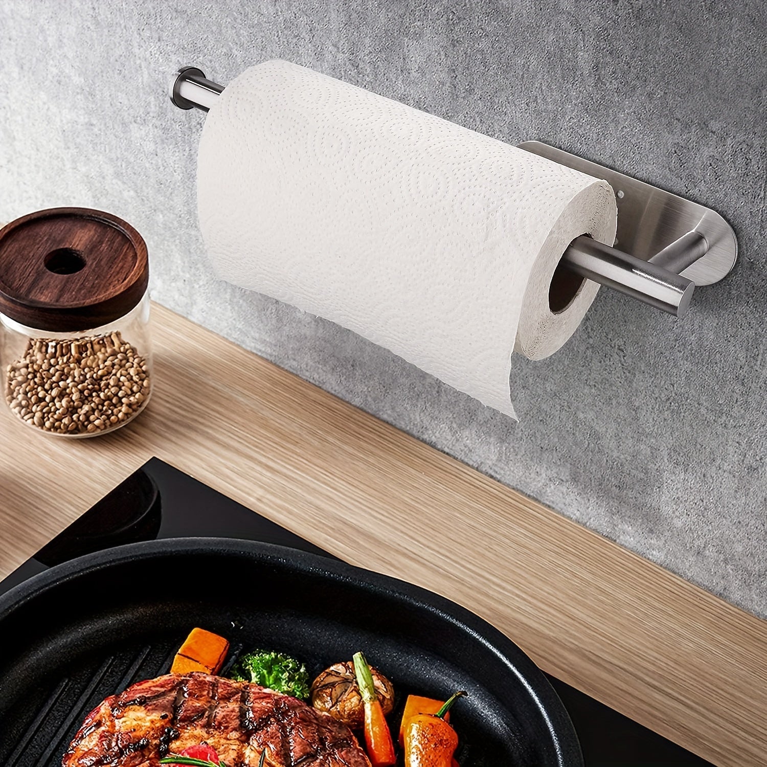 Stylish and convenient, the Modern Stainless Steel Wall Mount Paper Towel Holder in Brushed Silver is the perfect kitchen accessory for easy access to your paper towels. This sleek dispenser is designed to keep your paper towels organized and within