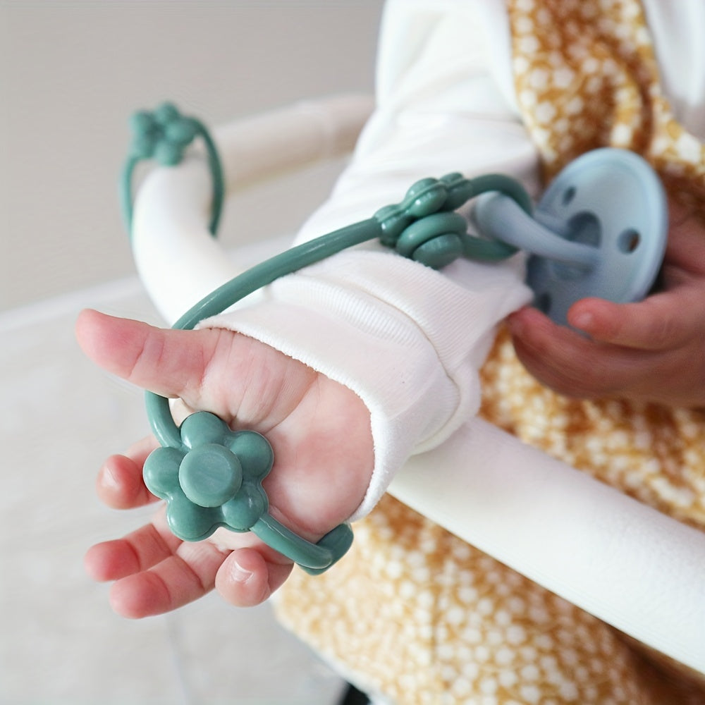 Keep your baby's pacifier secure with this adjustable silicone clip featuring a charming flower design. Suitable for babies 0-3 years old, this universal fit accessory can be attached to strollers, high chairs, car seats, and cribs. Ensure safety with