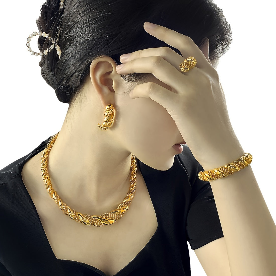 Beautiful bridal jewelry set featuring a golden-tone necklace, bracelet, earrings, and ring with intricate hollow design. Ideal for everyday wear, special occasions, engagements, weddings, and Indian-style events. Makes a perfect gift.