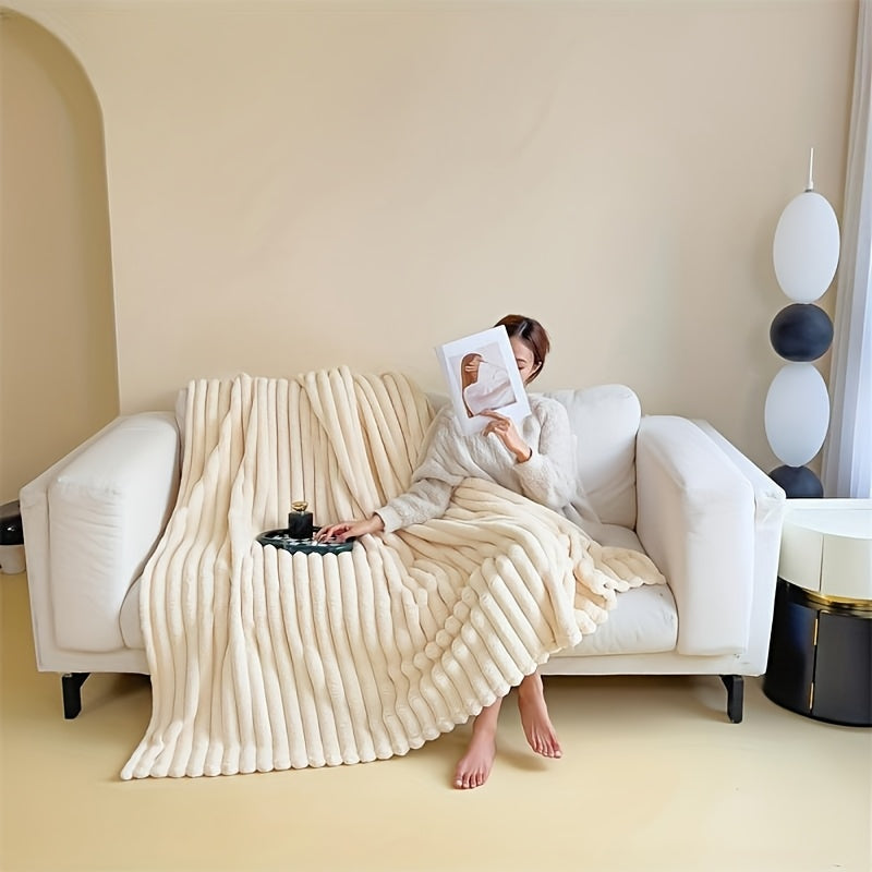 This elegant imitation rabbit fur shawl blanket is crafted from 100% polyester, featuring a soft knit fabric that provides all-season comfort. Versatile for use on the sofa, bed, in the office, or while traveling, this contemporary striped design is sure