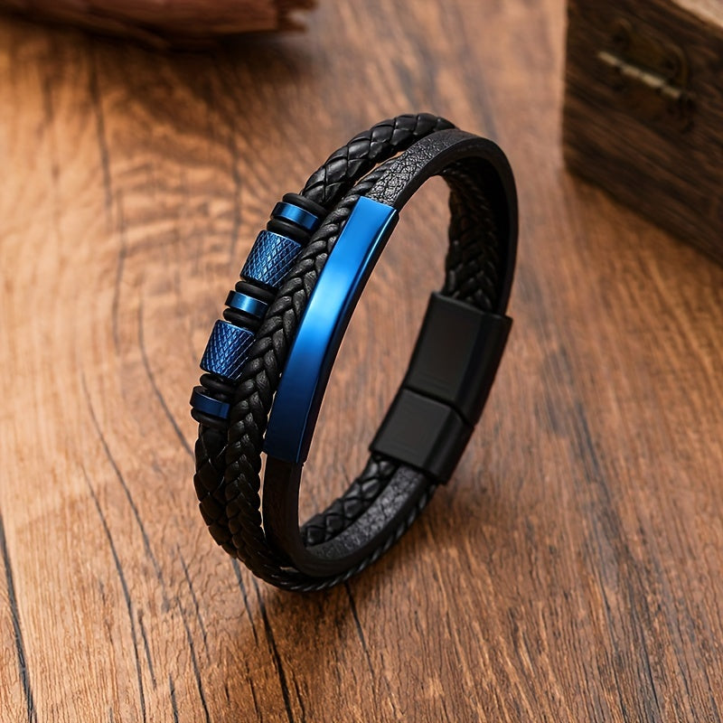 A stylish men's leather bracelet crafted from durable black stainless steel, accented with a touch of punk flair. Featuring a magnetic buckle closure and intricately handwoven details, this versatile accessory is perfect for any business or casual