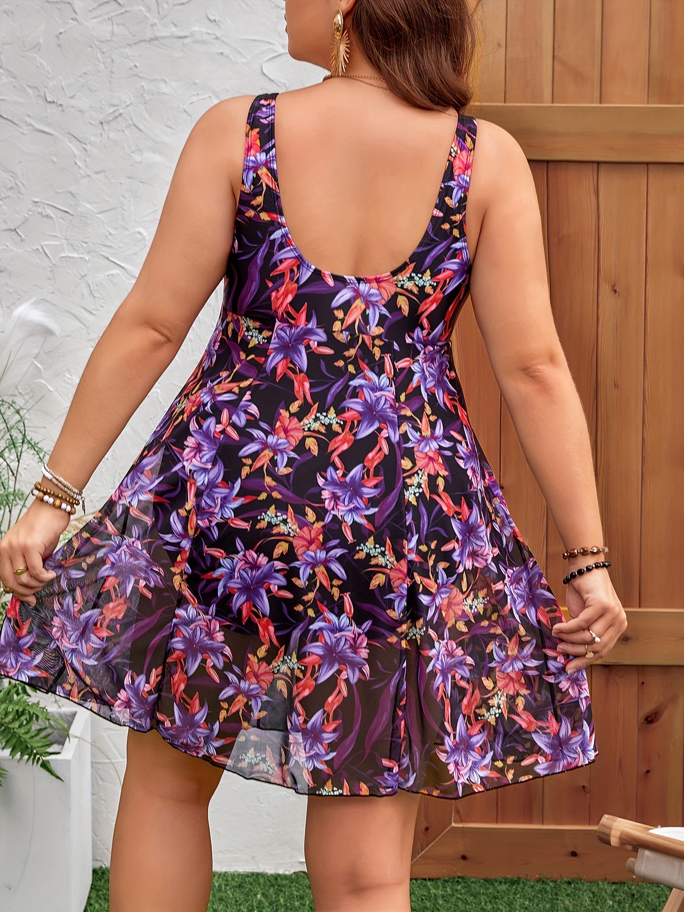 Stylish plus-size floral swimsuit with mesh skirt, off-shoulder design, stretchy fabric, and removable pads for easy care.