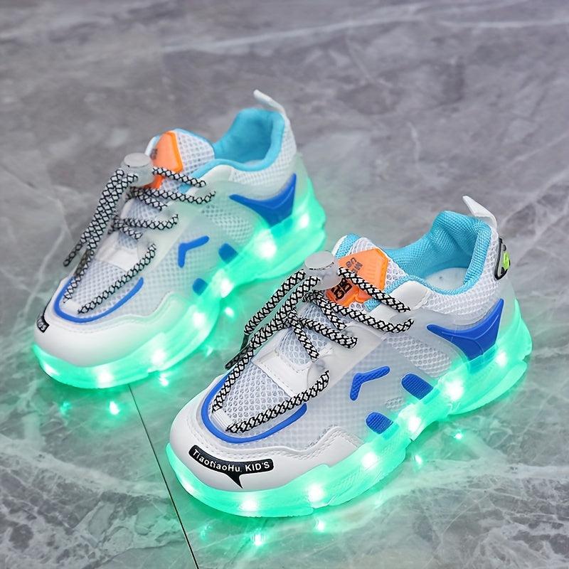 Children's LED light-up sneakers with breathable mesh, non-slip soft sole, and trendy street style for nighttime visibility, ideal for outdoor play and sports in white/blue/orange designs.