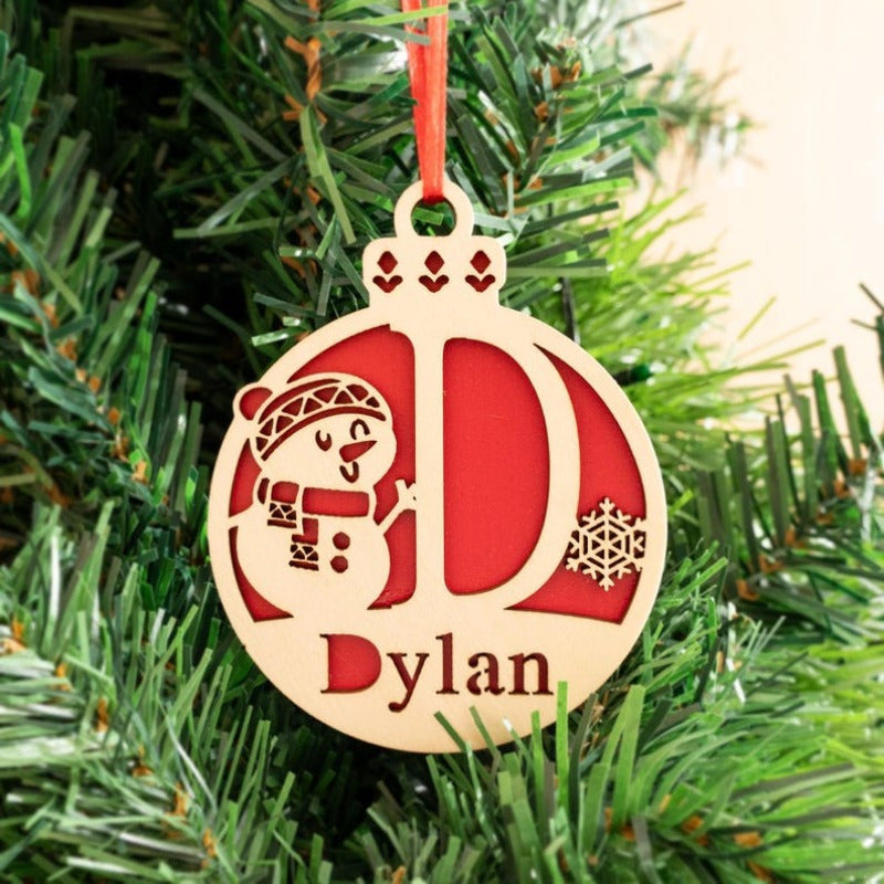 A unique gift for her: a personalized wooden Christmas ornament featuring a festive holiday tree decoration.