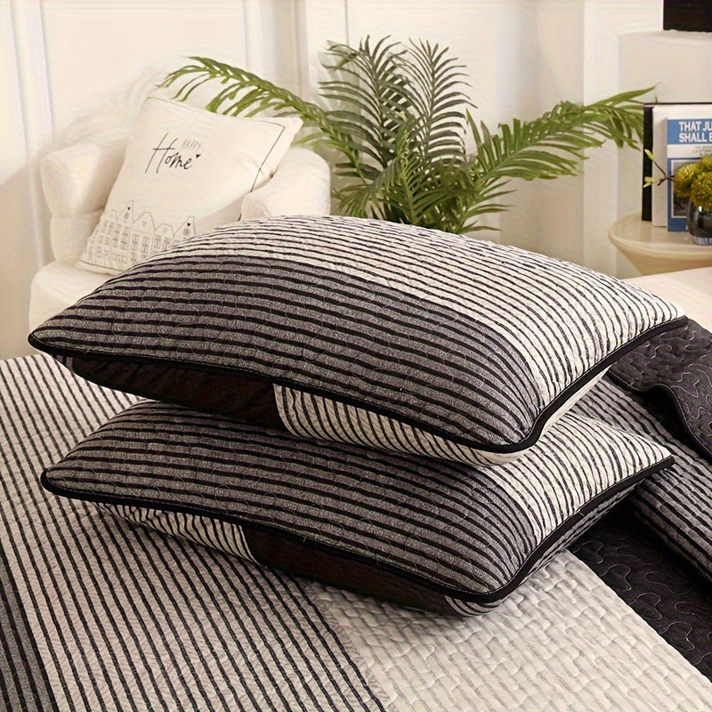 3-piece brushed bedspread set in black, grey, and white stripes, includes 1 bedspread and 2 pillowcases. Soft, warm, and quilted, suitable for bedroom and guest room decor. Core not